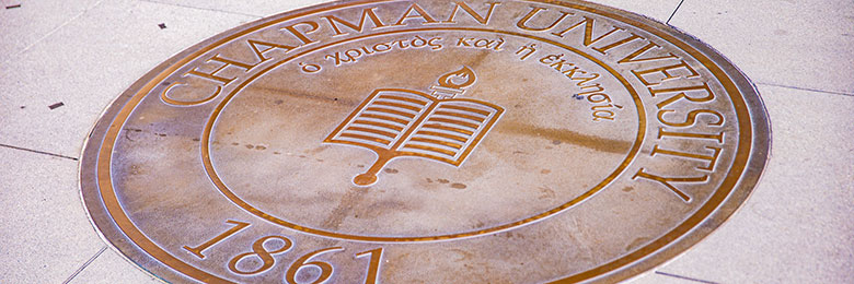 Chapman University seal in bronze on a pavement