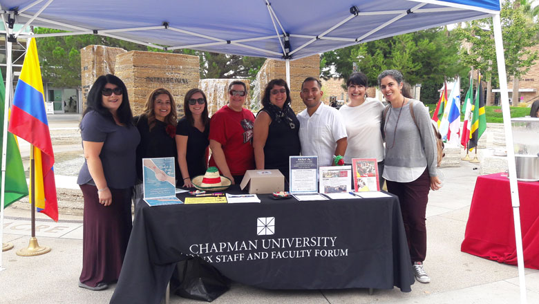 LatinX Forum members at Chapman University table outdoors