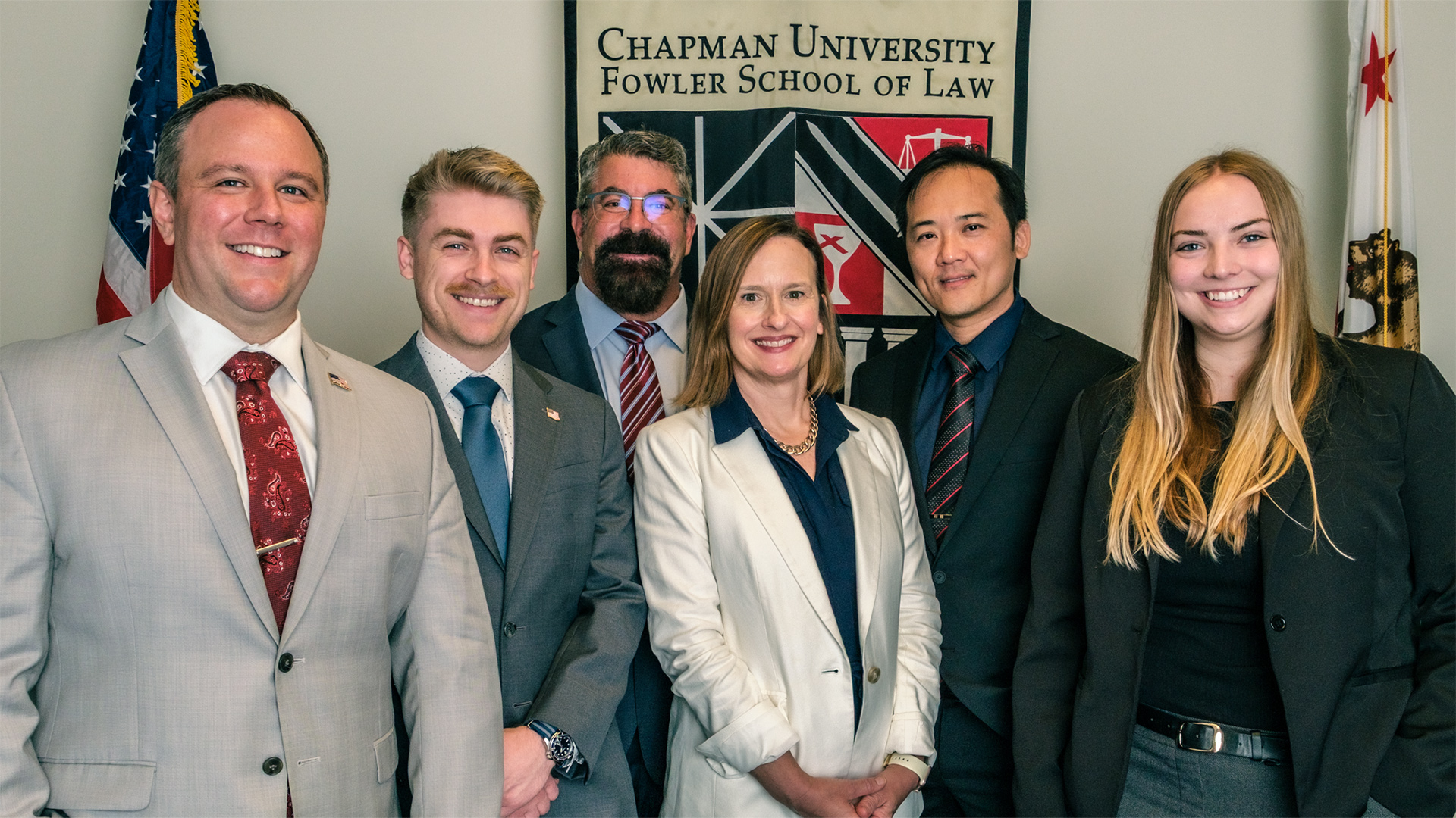Photograph of Chapman students who will be joining teh JAG corps after graduation.