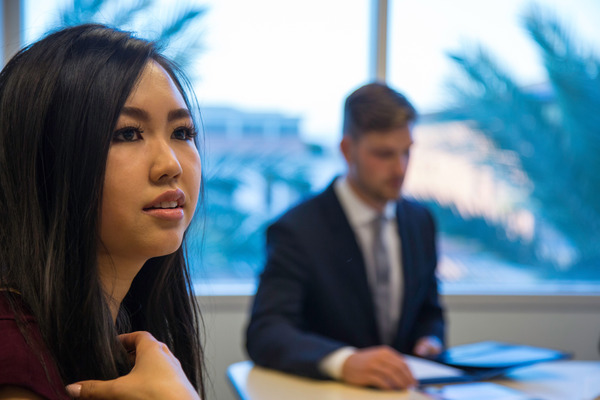 A female and male business student