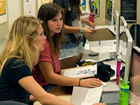 Students working together on a computer