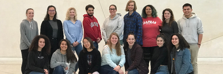 Students in a group smiling