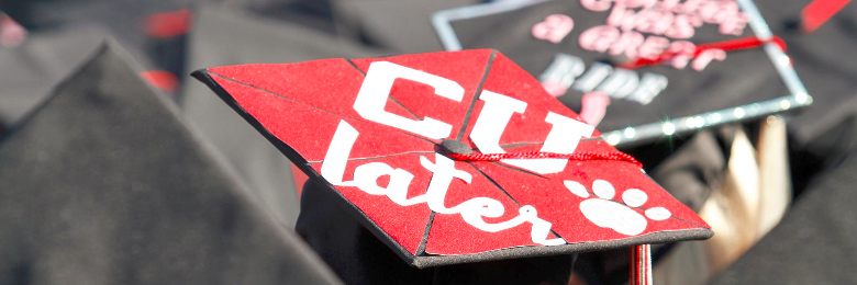 graduation cap with CU Later written