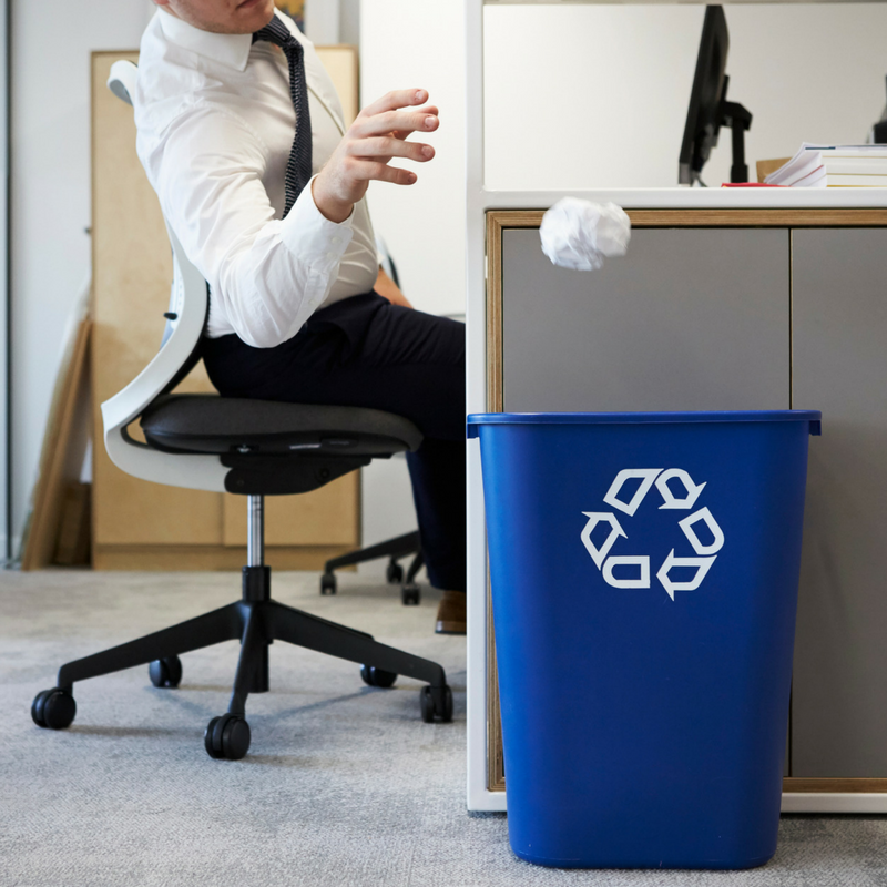 Recycling bin in an office setting.