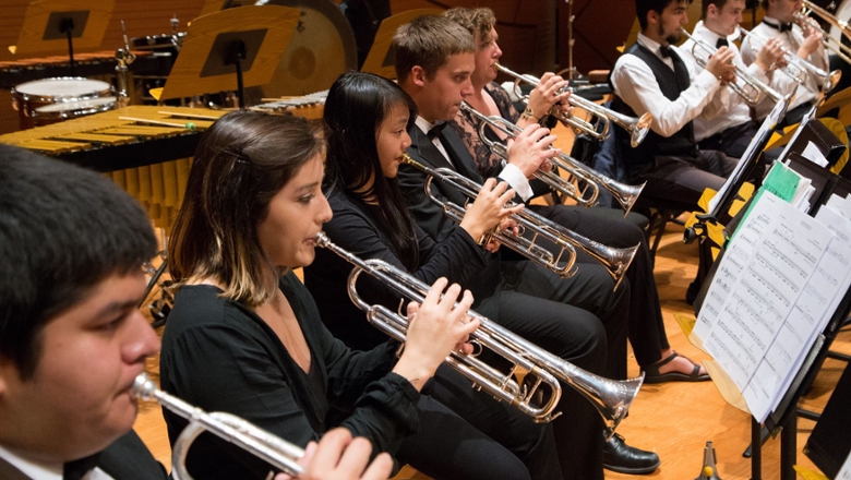 Brass musicians perform in Musco Center for the Arts