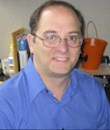 Headshot photo of Dr. Joshua Susskind