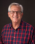 Headshot photo of Dr. Bruce Dehning